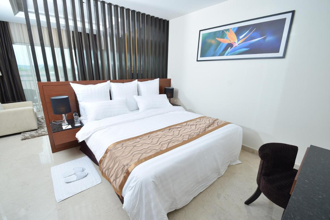 Tenera Hotel بانغي المظهر الخارجي الصورة A bedroom at the hotel